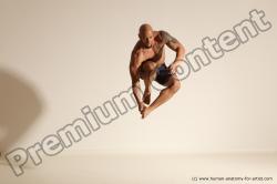 Underwear Gymnastic poses Man Black Muscular Bald Dancing Dynamic poses Academic